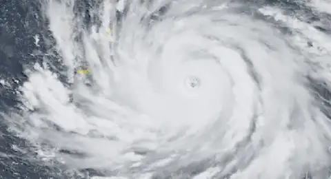 Philippines landslides kill 18 as Typhoon Bavi threatens region
